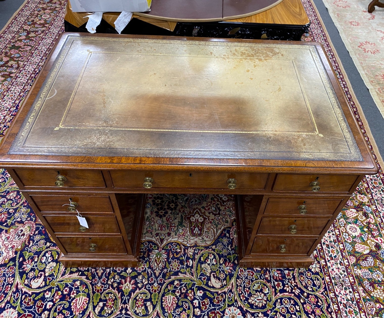 A small William Tillman reproduction George III style mahogany pedestal desk, length 112cm, depth 74cm, height 75cm
